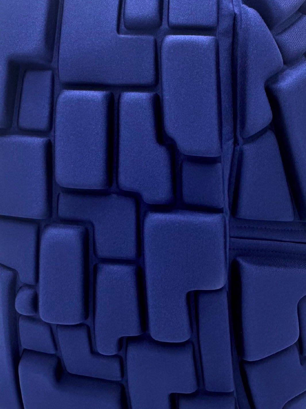 Close up of Blok 3D pattern on Wild Blue Yonder navy blue backpack - Madpax