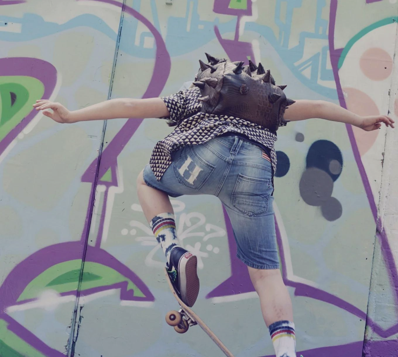 Boy riding skateboard with Madpax 3D Backpack