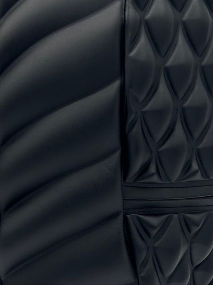 Up Close 3d Texture View of Fade to Black - black backpack - Madpax